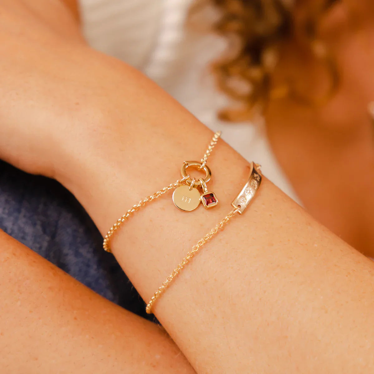 Luxury bracelet collection featuring polished metal and glistening gemstones, perfect for elevating your style.