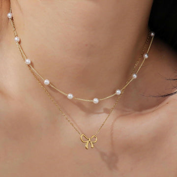 Kaze Minimalist Pearl Bow Necklace | Titanium Steel Pendant Necklace in Gold &amp; Silver