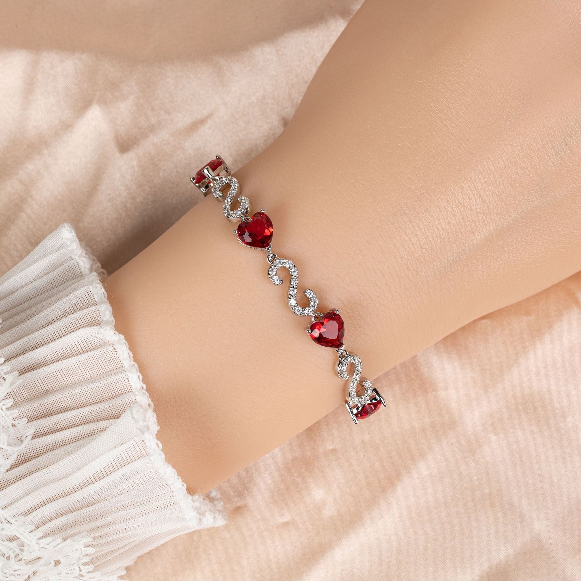 Kaze S925 Number-Spliced Heart Cubic Zirconia Bracelet | Sterling Silver Sparkling Bracelet in 2 Colours Rose-Red on a White Background