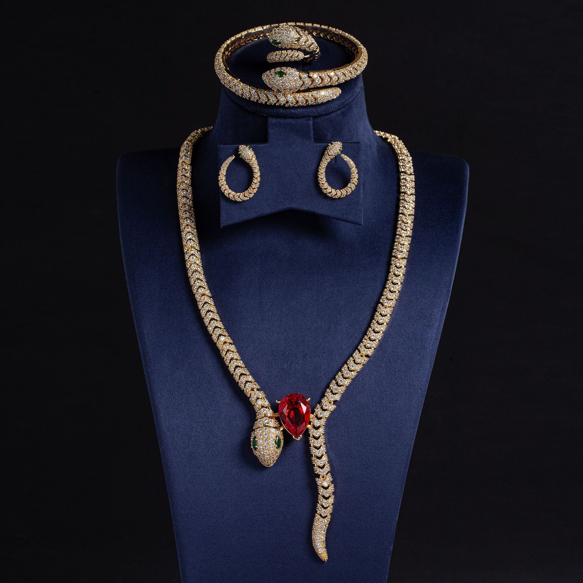Kaze Retro Snake Motif Necklace Set | Titanium Steel Cubic Zirconia Serpent Necklace Gold Background with Bright Red
