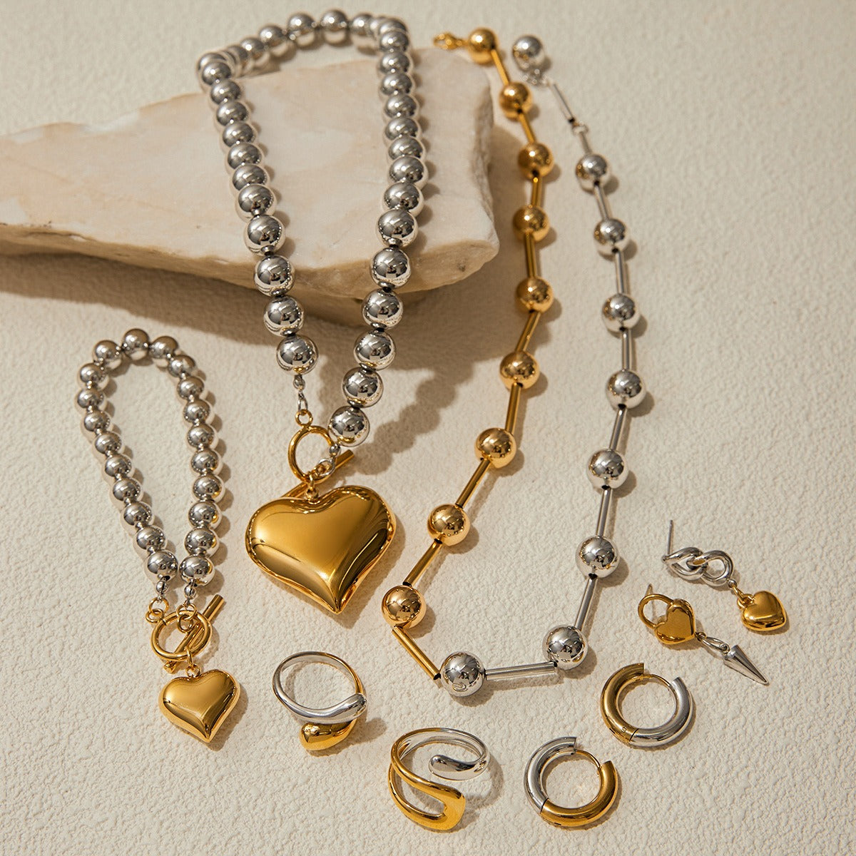 Kaze 18K Gold Heart-Shaped Jewellery Set with Gold and Silver Contrast | Necklace, Bracelet, Ring &amp; Earrings